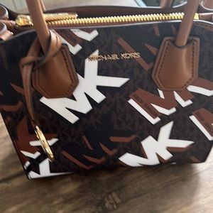 Just like new without tags. Used only for a few times but it was to small.